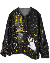 John Lennon Hand-Painted Denim Jacket in black denim with yellow, white and grey paint splatters, handprint and cassette details