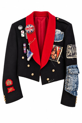 Black & Red Velvet Jacket featuring black velvet fabric, bold red shawl collar, gold buttons, denim patches, and eclectic pins and embellishments.